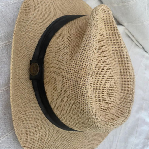 Beige hat with black band