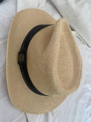 Beige hat with black band