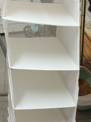 Fabric hanging shelf for wardrobe