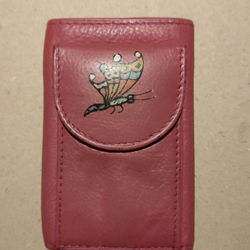 Leather wallet used, small purple with key holder