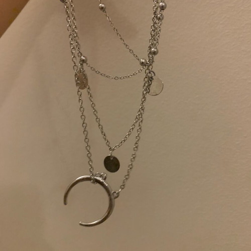 Stainless steel necklace new, four rows in silver color