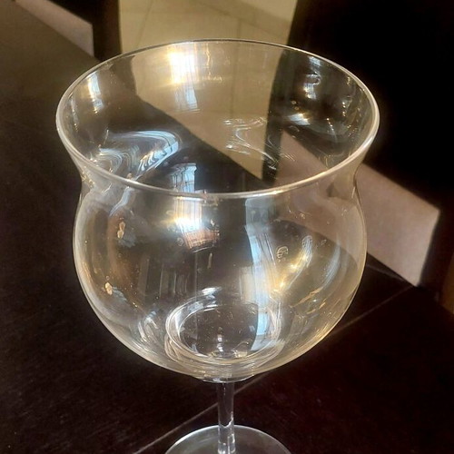 Glass vase with foot like new, tall decorative table piece