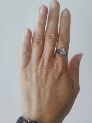 Floral ring handmade with lilac flowers in epoxy resin