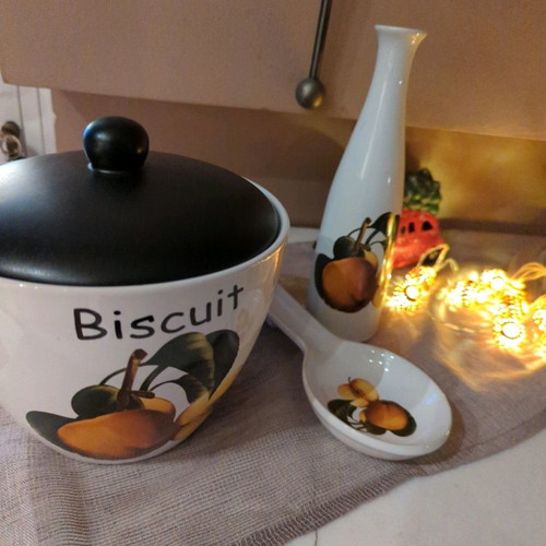 Ceramic biscuit jar set used with spoon and bottle