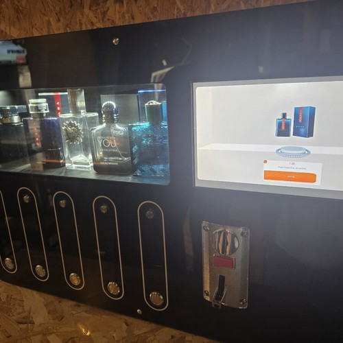 Automatic perfume vending machine with touchscreen and coin acceptor
