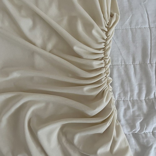 Zara cream mini dress like new, fitted with side and back ruching