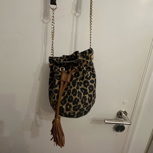 Juicy Couture crossbody bag used with leopard pouch