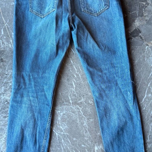 Women's blue jeans with rips and unique zipper like new