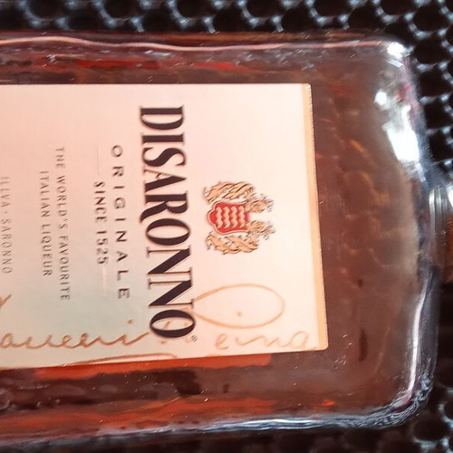 Disaronno Originale liqueur like new, decorative bottle