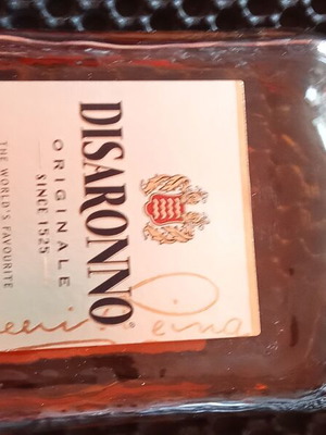 Disaronno Originale liqueur like new, decorative bottle