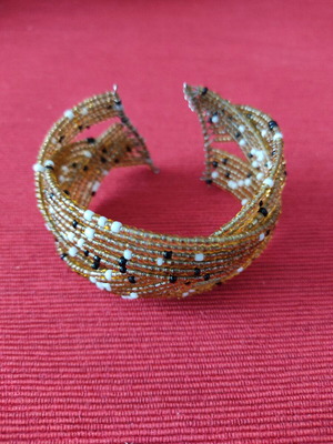 Thick beaded bracelet used, gold color