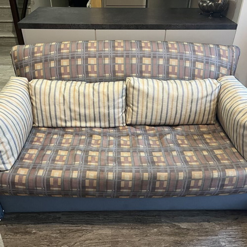 Two-Seater Sofa Bed used, practical and space-saving