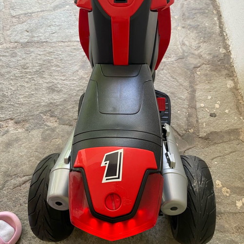 Electric children's motorcycle used with music