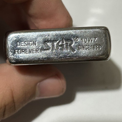 Star gasoline lighter used with American Style and You Light My Fire engravings