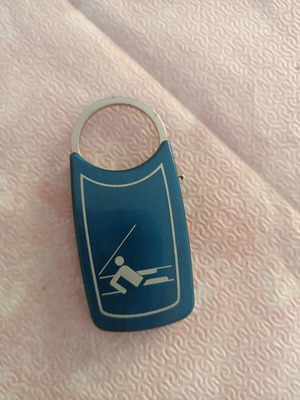 Keychain like new with sailing race theme, blue collectible
