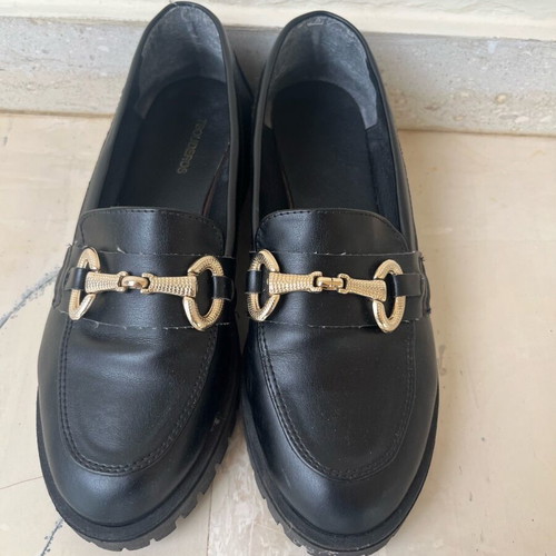 Tsouderos moccasins like new with gold detail and lug sole