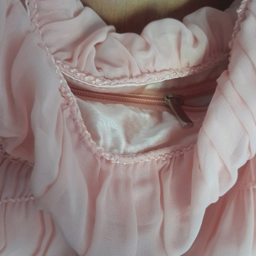 Pink bonbon bag used with zipper and lace details