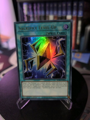 Sacrifice Level-Up Yu-Gi-Oh card like new ultra rare