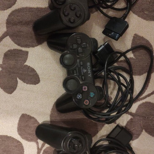 PlayStation 2 (PS2) console and accessories used bundle