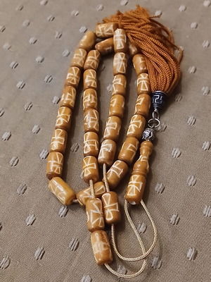 Komboloi carved genuine bone used with metal elements and tassel