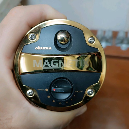 Okuma Magnetix fishing reel like new