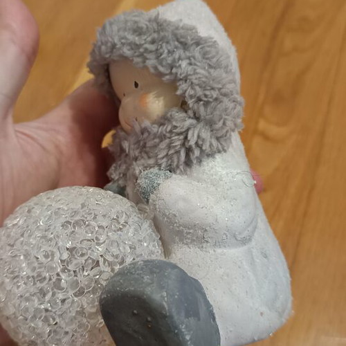 Ceramic girl with battery-powered LED light like new