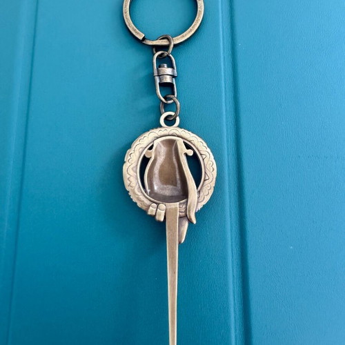 Game Of Thrones Hand of King Abysse keychain like new, multicolor