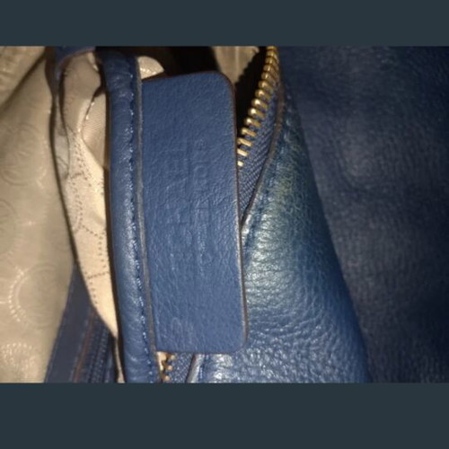 Michael Kors blue backpack