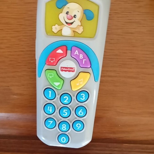 Fisher Price Laugh and Learn remote control used educational toy