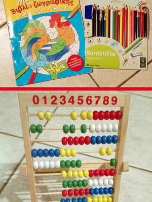 Mathematics and coloring book with colored pencils and abacus