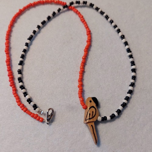 Parrot Necklace new, bright orange and black-white colors