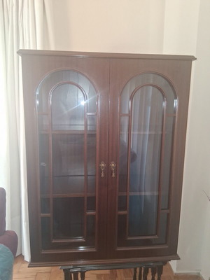 Classic showcase made of solid wood with arched glass doors, like new