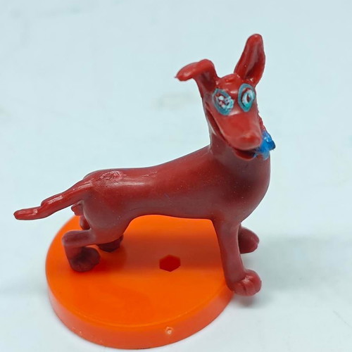 Vintage dog figure like new with orange base