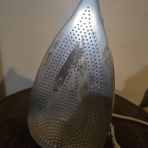 Rowenta iron used, works but may leak