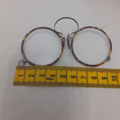 Presbyopia glasses antiques from 1920 used, brown and yellow
