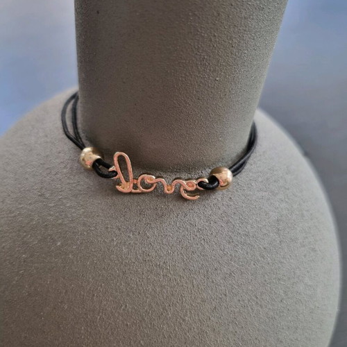 Love bracelet new with adjustable black and gold elastic