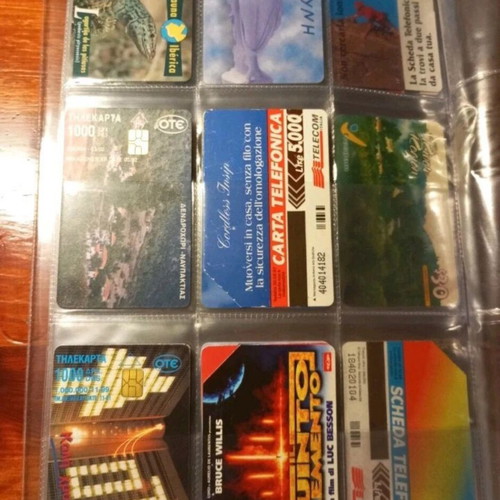 Phone card album like new, 75 cards from various countries and Greece