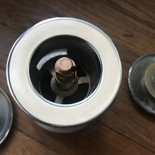Brass mushroom sink valve used with two caps