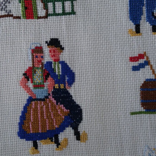 Embroidery with traditional costumes and Dutch scenes like new