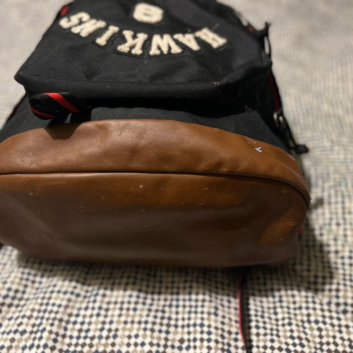 Eastpak Stranger Things backpack used, black with stain