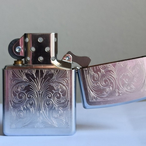 Zippo vintage lighter 2003, new, embossed design