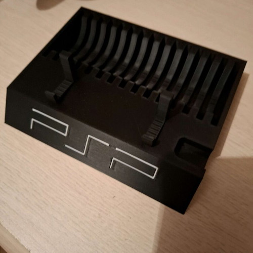 PSP stand like new for device and 15 games with charging support