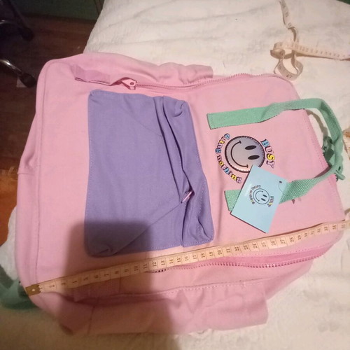 Backpack new with pockets and zipper, 70% cotton 30% polyester