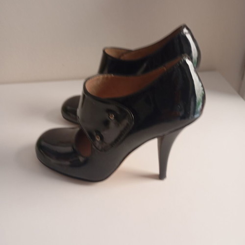 Paco Gil women's pumps size 35.5 like new black and gold