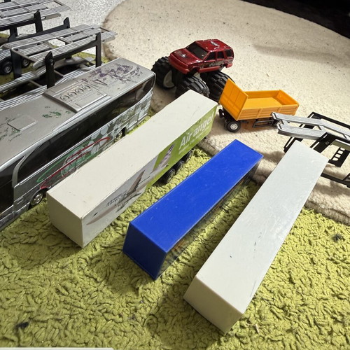 Large collection of toy trucks with accessories