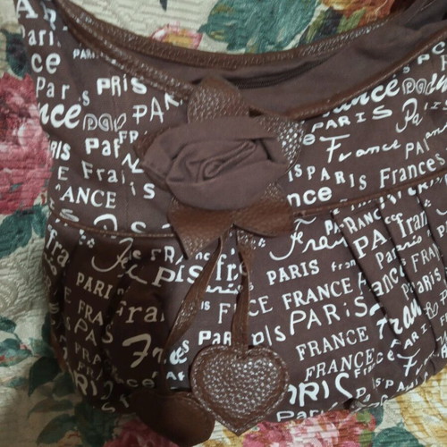 Fabric bag with decorative flower
