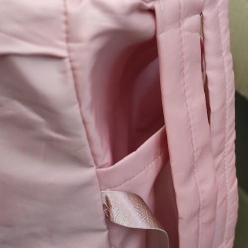 Barrel-shaped pink backpack