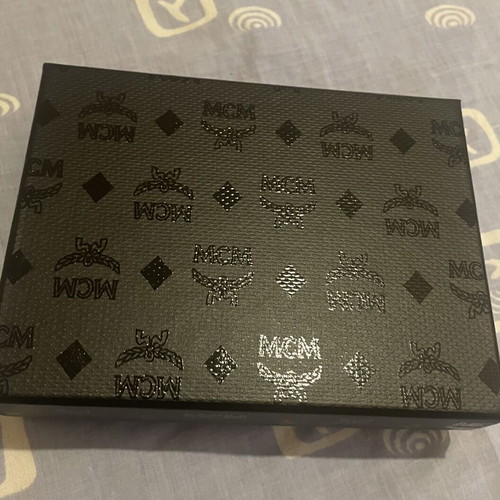 MCM Star Lion bag charm new, black and brown