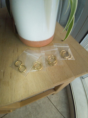 Gold stainless steel hoop earrings, 4 pairs, new in packaging