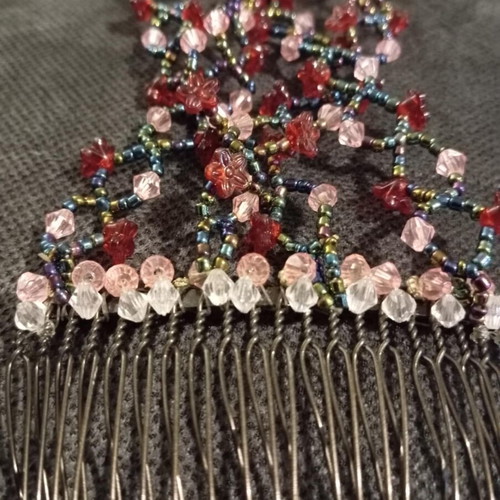 Hair comb like new with red, pink, black and transparent beads